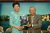 The Secretary for Development, Mrs Carrie Lam, and Chairman of the Hong Kong Jockey Club (HKJC), Mr John Chan, today (July 15) announced that the Government would enter into a partnership with HKJC to take forward the conservation and revitalisation of the Central Police Station (CPS) Compound. Mrs Lam and Mr Chan hold a copy of the Conservation Management Plan for the CPS Compound commissioned by the Jockey Club.