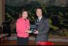 The Secretary for Development, Mrs Carrie Lam, presents a souvenir to Chinese Consul-General in Melbourne, Mr Shen Weilian.