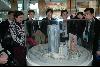 The delegation looks at a model of Roppongi Hills.