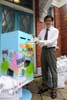 The Commissioner for Heritage, Mr Jack Chan, sends postcards featuring winning entries of the Historic Buildings Drawing Competition at a free posting of postcards activity to spread the message of heritage conservation.