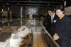 Mrs Carrie Lam, views a model of Bethanie in the "Heritage Alive: UNESCO Culture Heritage Awards" Exhibition. Accompanying Mrs Lam is the Commissioner for Heritage, Mr Jack Chan.