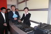 The Secretary for Development, Mrs Carrie Lam, visits the DJ mixing and scratching workshop at the Tuen Mun Children and Juvenile Home.