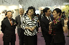The Office of the Government of the Hong Kong Special Administrative Region (HKSAR) in Beijing today (July 1) organised a cocktail reception to celebrate the 14th anniversary of the establishment of the HKSAR and kickstarted the Hong Kong Heritage Tourism Expo in Beijing. The exhibition is co-organised by the Beijing Office and the Commissioner for Heritage's Office with an aim of introducing to Beijing audience specially designed heritage tour routes in Hong Kong that showcase the city's distinctive cultural history. Picture shows Deputy Director of the Hong Kong and Macao Affairs Office of the State Council, Ms Hua Jian (centre), joining the Director of the Beijing Office, Mr Thomas Tso (first left), and the Commissioner for Heritage, Mrs Laura Aron (first right), to visit the exhibition.