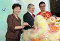 Mrs Lam and Mr Zilk dot the eyes of the lion for the lion dance.