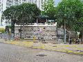 Hau Wong Temple Compound is situated on a terrace with granite steps leading down to Junction Road.