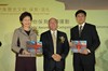 Regional Advisor for Culture in Asia and the Pacific of the United Nations Educational, Scientific and Cultural Organisation, Dr Richard Engelhardt (Centre), presenting souvenirs to Mrs Carrie Lam (left) and the Director of Leisure and Cultural Services, Mr Thomas Chow (right).