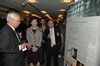 Mrs Lam and other officiating guests viewing the exhibition panels of the Public Awareness Campaign on Heritage Conservation.