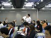 participants asking questions & expressing views at the seminar