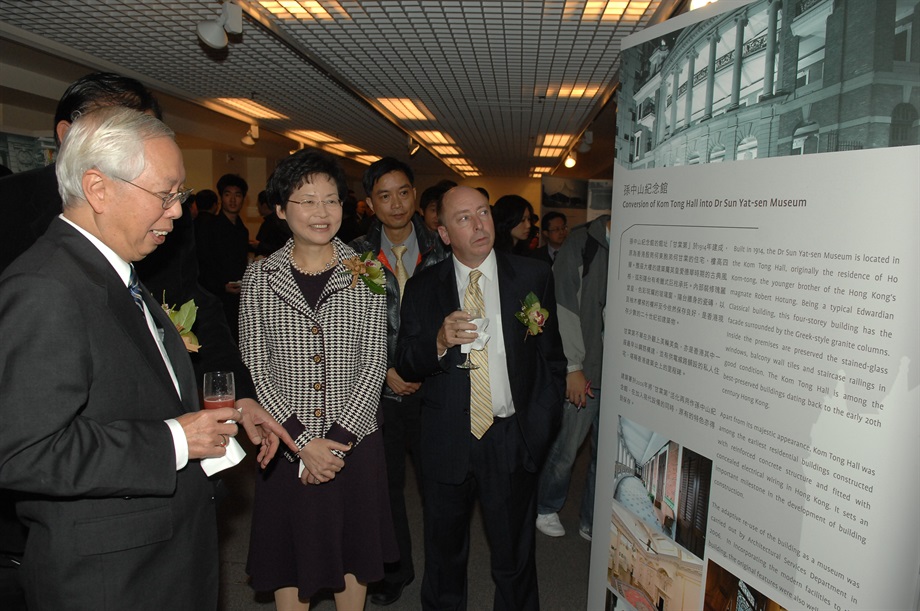 Mrs Lam and other officiating guests viewing the exhibition panels of the Public Awareness Campaign on Heritage Conservation.