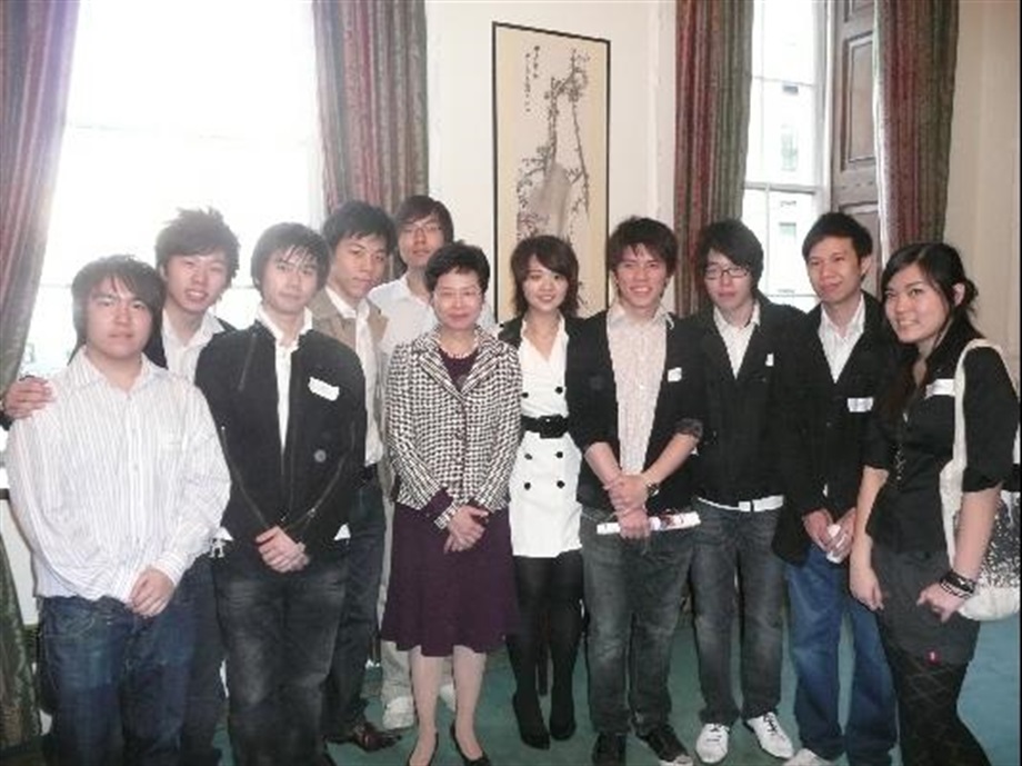 The Secretary for Development, Mrs Carrie Lam, with a group of Hong Kong students studying in the UK.