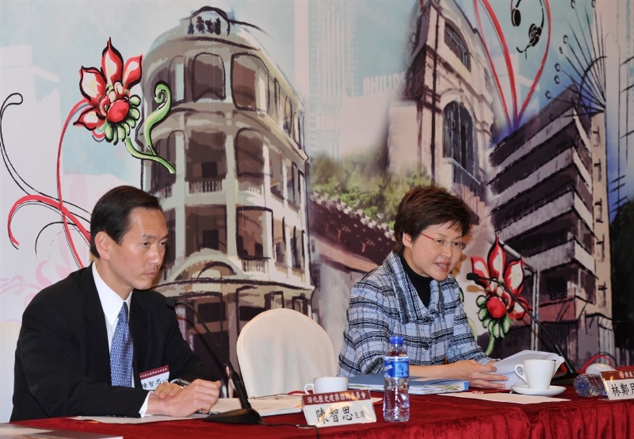 Secretary for Development, Mrs Carrie Lam, announces the selection results of the buildings included under Batch I of the Revitalising Historic Buildings Through Partnership Scheme at a press conference on February 17. Looking on is Chairman of the Advisory Committee on Revitalisation of Historic Buildings, Mr Bernard Chan (left).