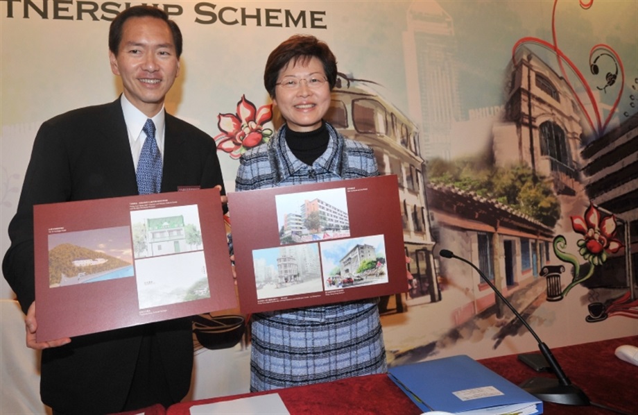 Secretary for Development, Mrs Carrie Lam, unveils the selection results of the buildings included under Batch I of the Revitalising Historic Buildings Through Partnership Scheme with Chairman of the Advisory Committee on Revitalisation of Historic Buildings, Mr Bernard Chan, at a press conference on February 17.