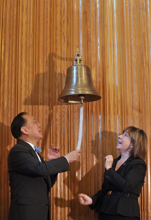 Mr Tsang and the President of SCAD, Ms Paula Wallace, ring the bell signifying the commencement of SCAD in Hong Kong.