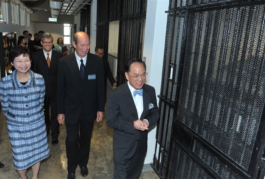 Mr Tsang and Mrs Lam tour the preserved jail cells at SCAD. Accompanying them is Mr Bob Dickensheets, Director of Construction and Preservation, SCAD Hong Kong (second from left).
