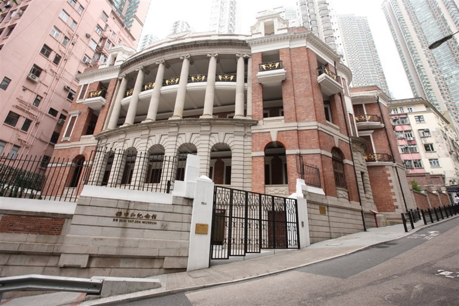 The Kom Tong Hall in Central has been declared a monument under the Antiquities and Monuments Ordinance. Kom Tong Hall was built in the Edwardian classical style, featuring red brick walls, granite dressings around windows and doors, and ornate ironwork on balconies.