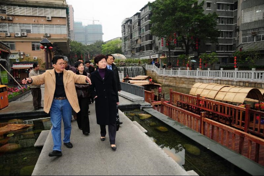 Mrs Lam sees for herself Liwan Brook after the restoration works.