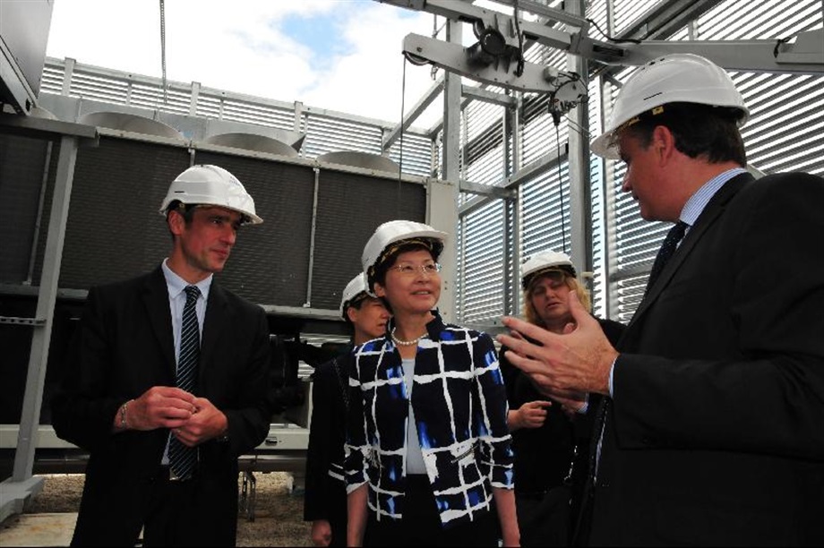 Mrs Lam is briefed on the energy-saving technologies at the Australia Building in Paris.