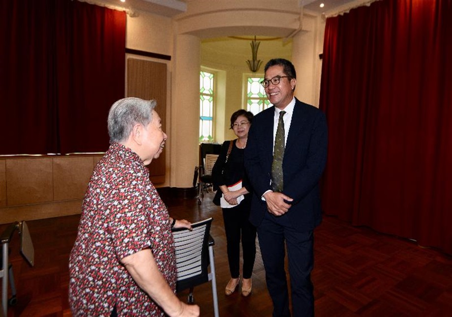 The Secretary for Development, Mr Michael Wong, toured Haw Par Music Farm in the revitalised Haw Par Mansion during his visit to Wan Chai District today (May 31). Picture shows Mr Wong (first right) talking with the Haw Par Music Foundation Council Chair, Ms Sally Aw (first left).