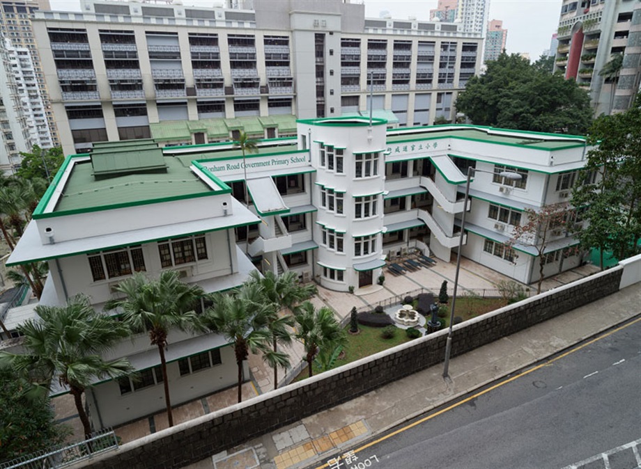 The Government today (July 16) gazetted a notice announcing that the Antiquities Authority (i.e. the Secretary for Development) has declared Bonham Road Government Primary School in Sai Ying Pun, the Old Tai Po Police Station in Tai Po and Hip Tin Temple in Sha Tau Kok as monuments under the Antiquities and Monuments Ordinance. Photo shows the bird's eye view of the main building of Bonham Road Government Primary School, showing its E-shaped plan comprising a long centre portion and a wing on each end.